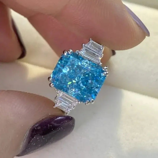 Blue Emerald Cut Solitaire Ring