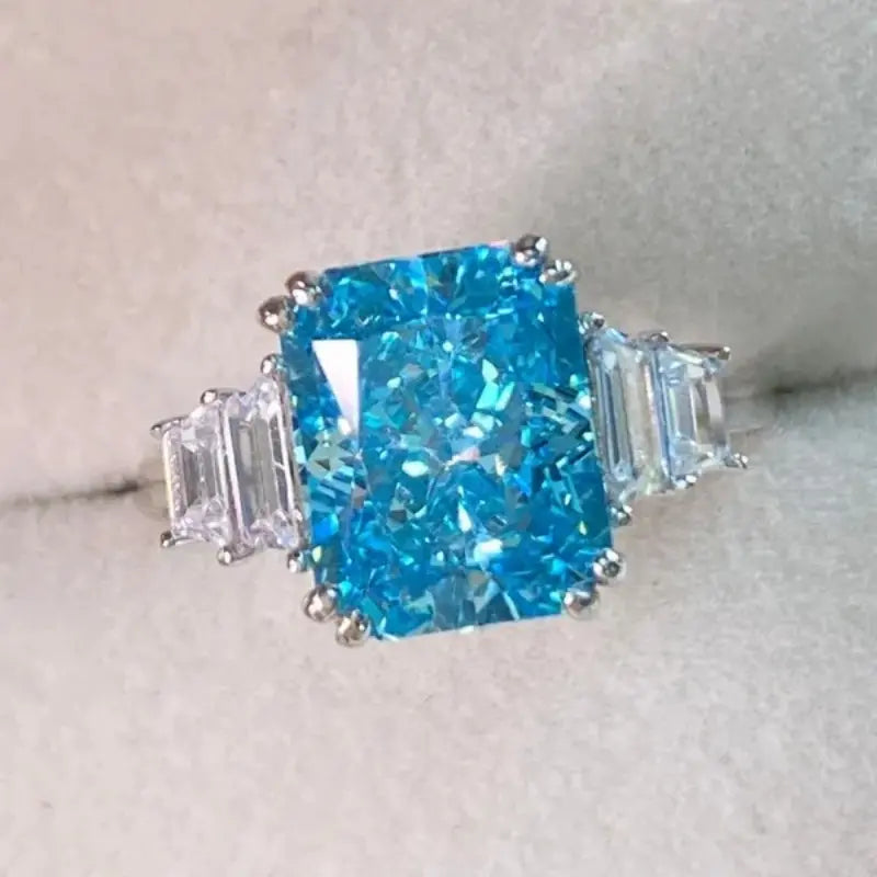 Blue Emerald Cut Solitaire Ring