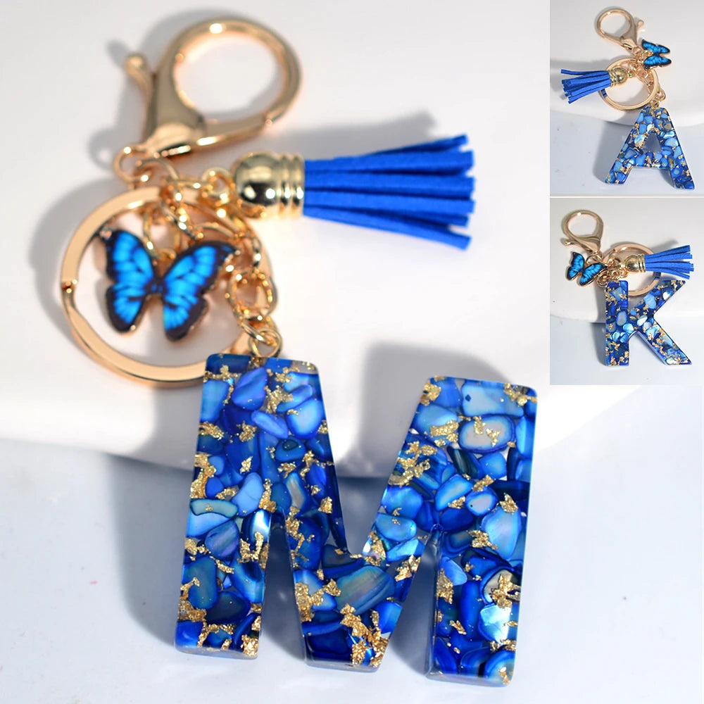 Blue Acrylic Initial Keychain with Butterfly and Tassel