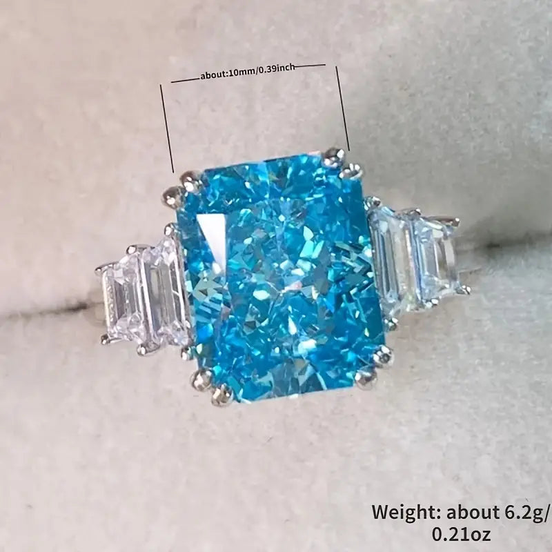 Blue Emerald Cut Solitaire Ring