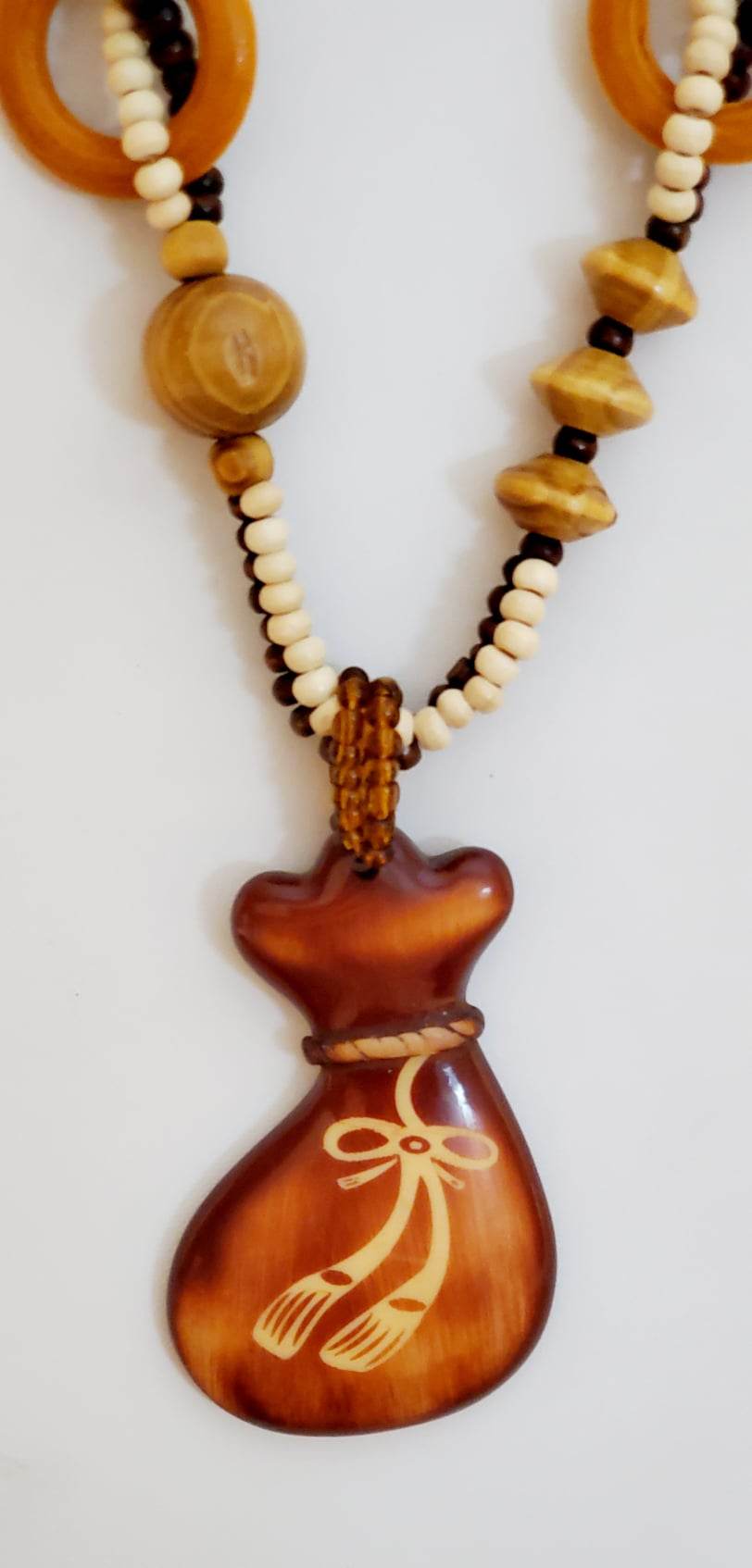 Earth-Tone Wooden Bead Necklace with Bow Pendant